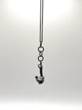 Black Cradle Silver Necklace