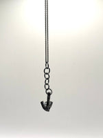 Black Cradle Silver Necklace