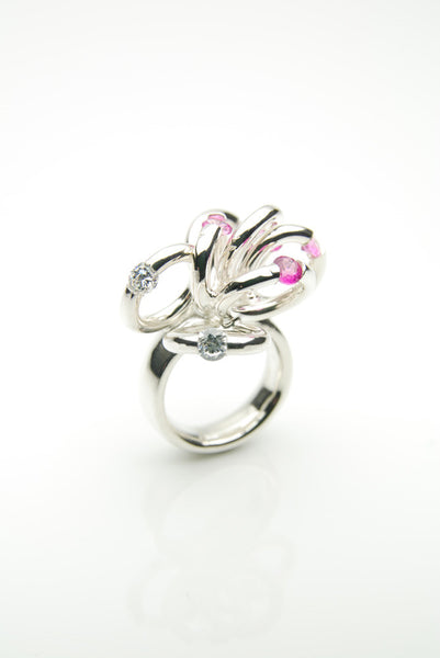 Handmade silver ring with pink rubies and white zirconia