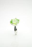 Handmade silver ring set with a green zircon by Orr