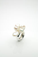 Orr handmade silver ring with a cluster of organic pearls on top